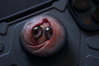 Image 8 of Custom Swappable Phone Grip for smartphones, double iris, reflective pupil, glow in the dark