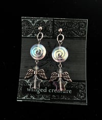 Image of flying swirl earrings 