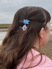 Image 1 of Butterfly and flower hair grips 