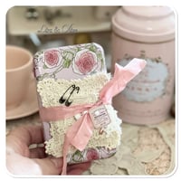 Image 6 of A Petite French tin with a needle book and tattered pin cushion