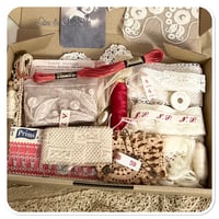 Image 5 of box of vintage french lace and other haberdashery items.