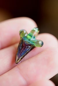 Image 1 of micro glass shark tooth pendant.