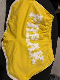 Yellow FREAK booty shorts 