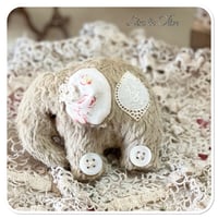 Image 2 of Handmade beige flat elephant with "button wheels"