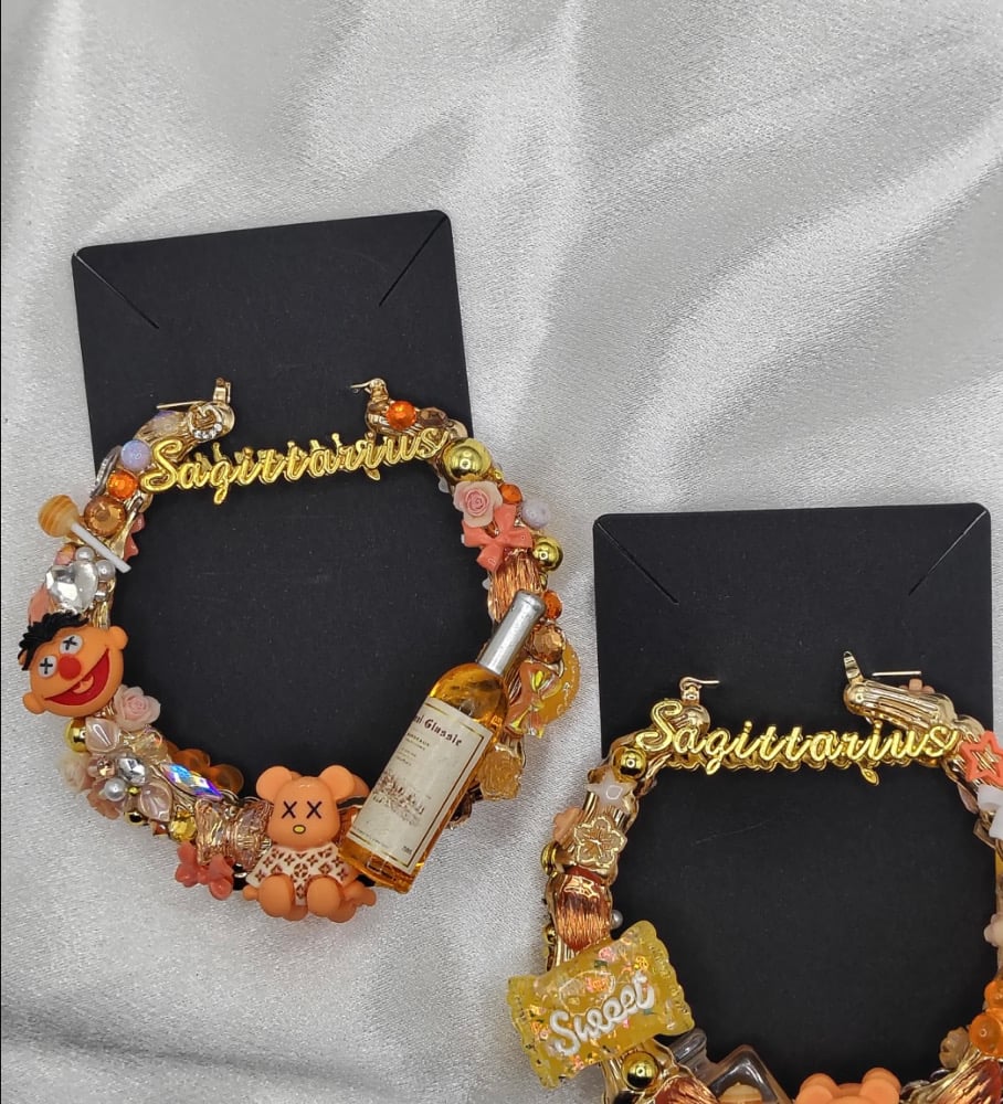 Image of zodiac sign junk earrings