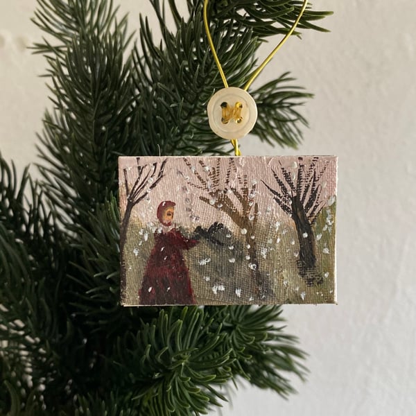 Image of Lady and crow in pink sky landscape - miniature painting 