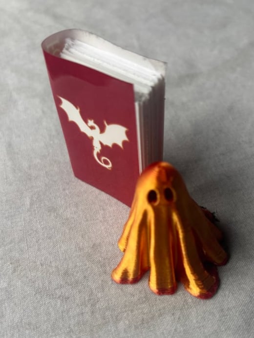Image of Ghost with trope book 