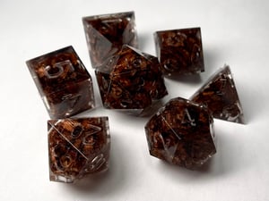 Image of Walnut wood shavings (preorder) 7-piece dice set for TTRPGl