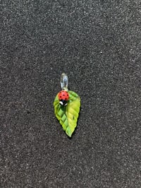 Image 1 of Green Leaf W/ Red Bug Eyed Ladybug pendant 