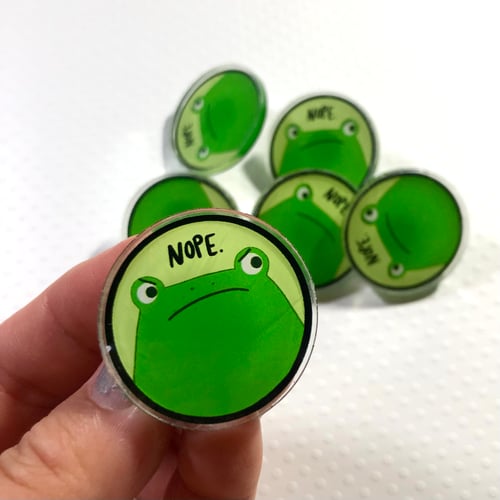 Image of NOPE frog clear acrylic pins 