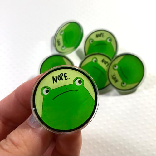Image of NOPE frog clear acrylic pins