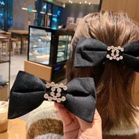 Image 1 of Black CC bow