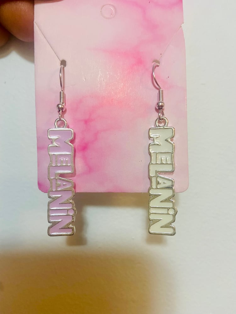 Image of White and purple melanin earrings