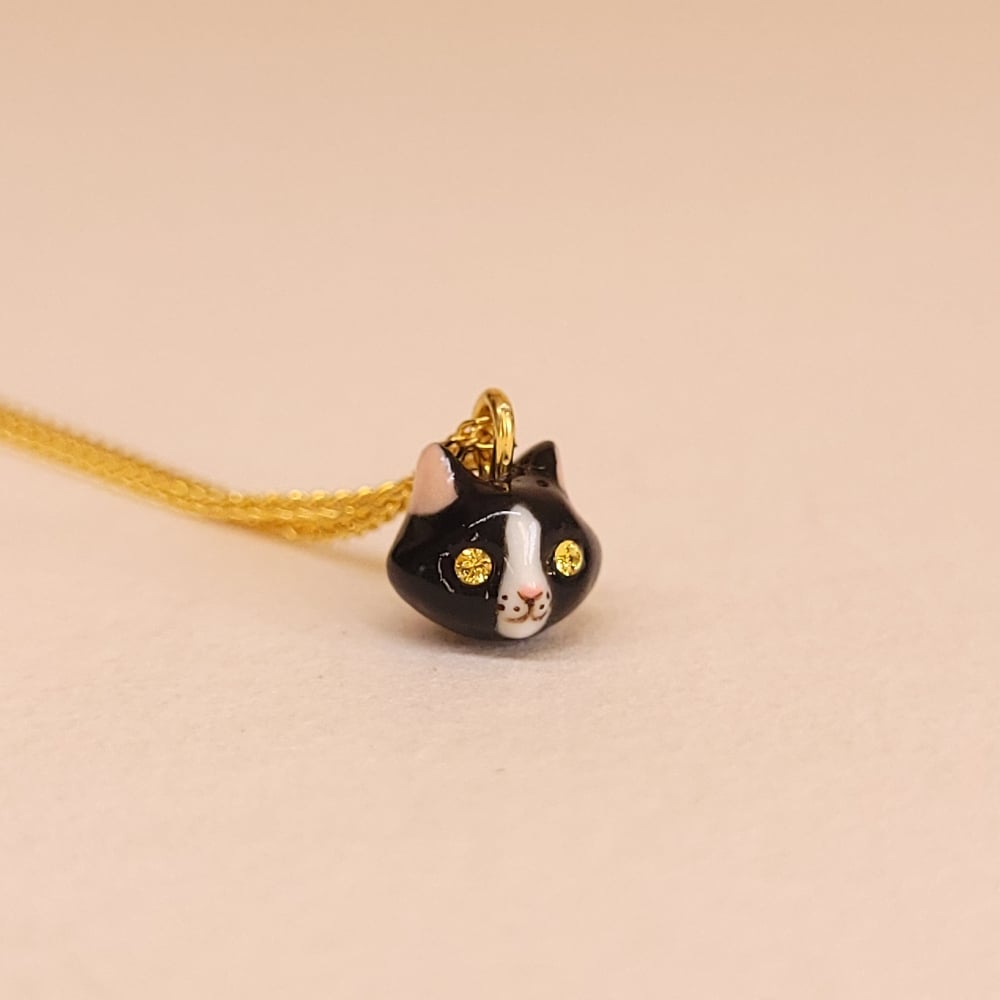 Image of Tuxedo Porcelain & Gold Vermeil Teeny Tiny Cat Pendant