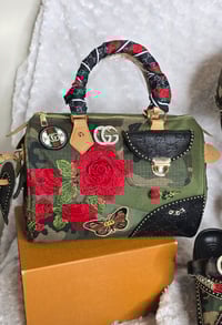 Camo bag with black gorg g and Red rose
