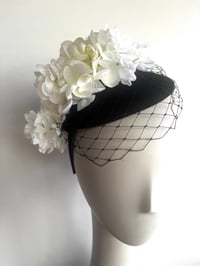 Image 1 of Black felt button trimmed with flowers