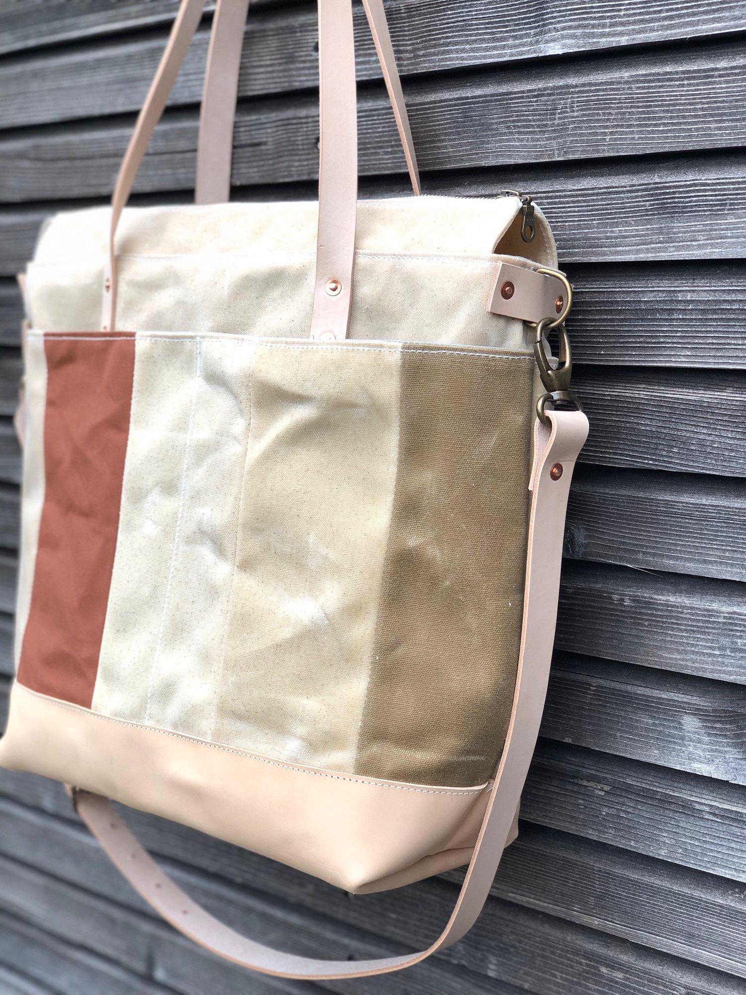 Image of  Large tote bag in waxed canvas and leather with cross body strap 