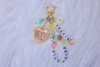 Image 2 of 'kiss later' LOONA keychain