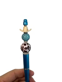 Image 2 of Cowboy Hat On Blue Pen