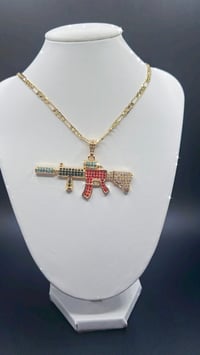 Image 1 of GOLD COLOR DIAMOND GUN 