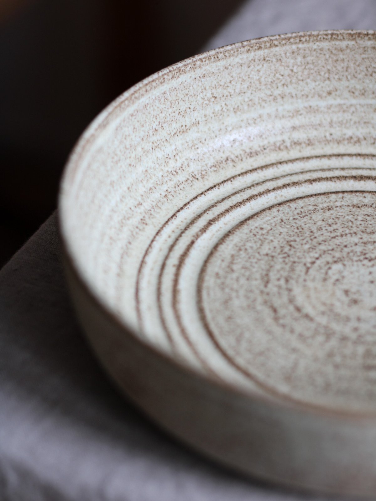 Image of medium pasta bowl in dune (carved)