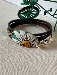 Image 1 of A Half Turquoise Daisy 