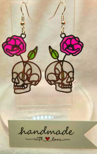 Image 2 of Handcrafted Resin Glow In The Dark Skull and Rose Earrings 