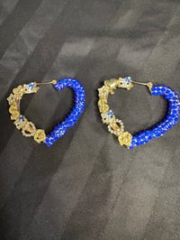 Blue heart charmed junk earrings 