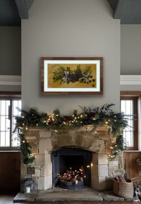 Image 2 of Christmas greens with red berries and pine cones and a sweet white bow. 