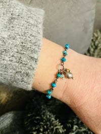 Image 1 of turquoise and pearl charm bracelet