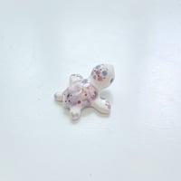 Image 1 of Tiny galaxy baby turtle figurine