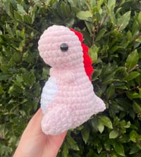 Image 1 of dinosaur plushie