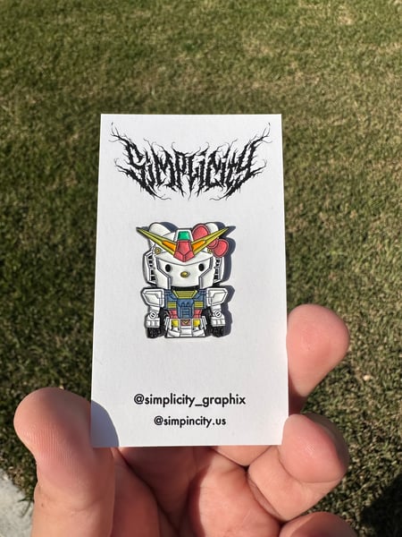 Image of Hello kitty glow in the dark pin