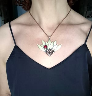 Sunflower pendant with ladybug 