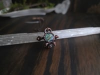 Porcupine vertebra with round Blue Labradorite