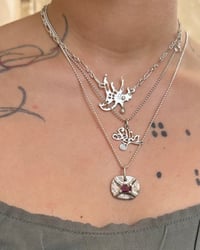 Image 3 of Cradled red gem charm 