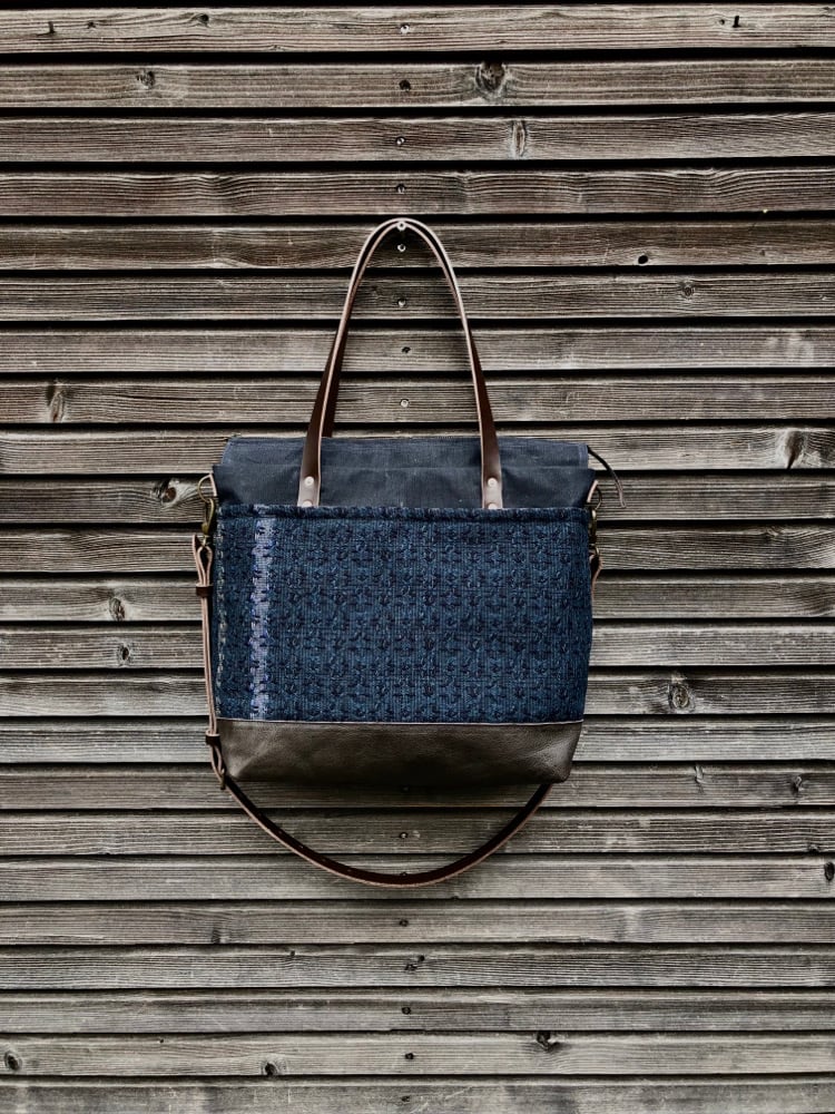 Image of Black Waxed canvas carryall with handwoven exterior pocket 