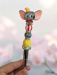 Image 1 of Elephant With Feather Pen
