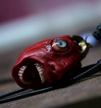Image 1 of Egg of the King bleeding eyes pendant, adjustable cord, OOAK,