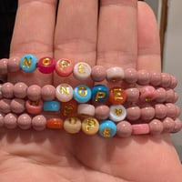 Image 3 of rejection bracelets