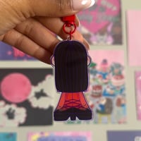 Image 4 of katseye 'monstereye v1' moveable ear keychains.