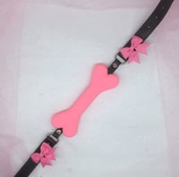 Pink/ black bone gag 