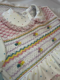 Image 2 of girls multi dot smocked babygrow