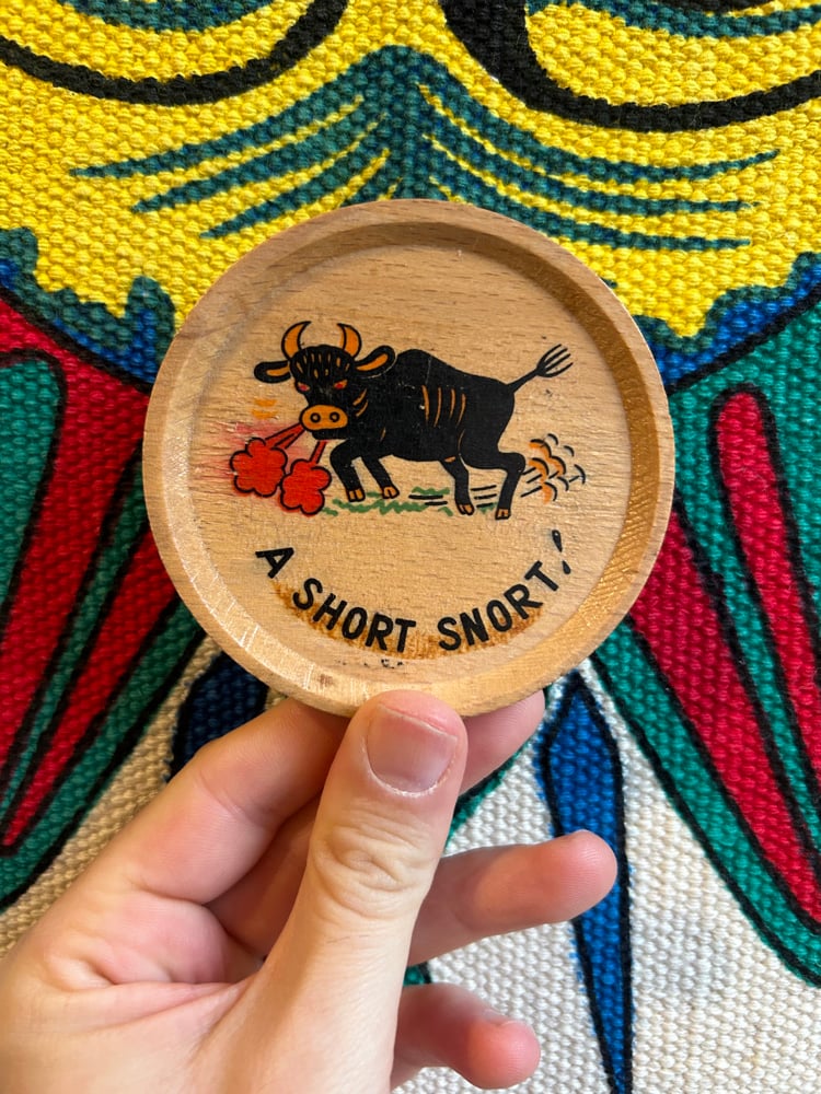 Image of vintage bull coaster