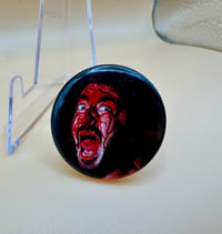 New Mancer bloody face pin