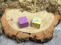 Image 3 of D6 Dice Pair Purple and Yellow with Star Pips