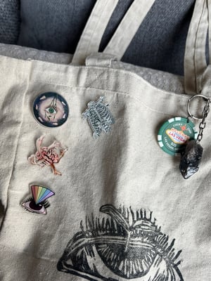 Image of 'Watching You' Pin