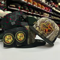 Image 2 of New Era 9Fifty Black Real Tree Trucker 40yrs