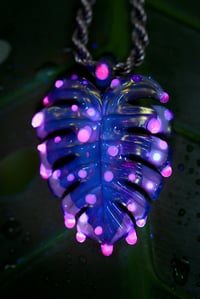 Image 2 of Drippy uv variegated monstera leaf pendant. 🌿💧