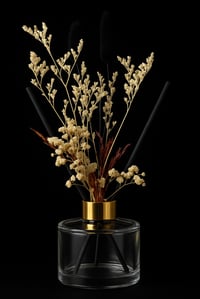 White  with dark blue bunny tail flower reed 